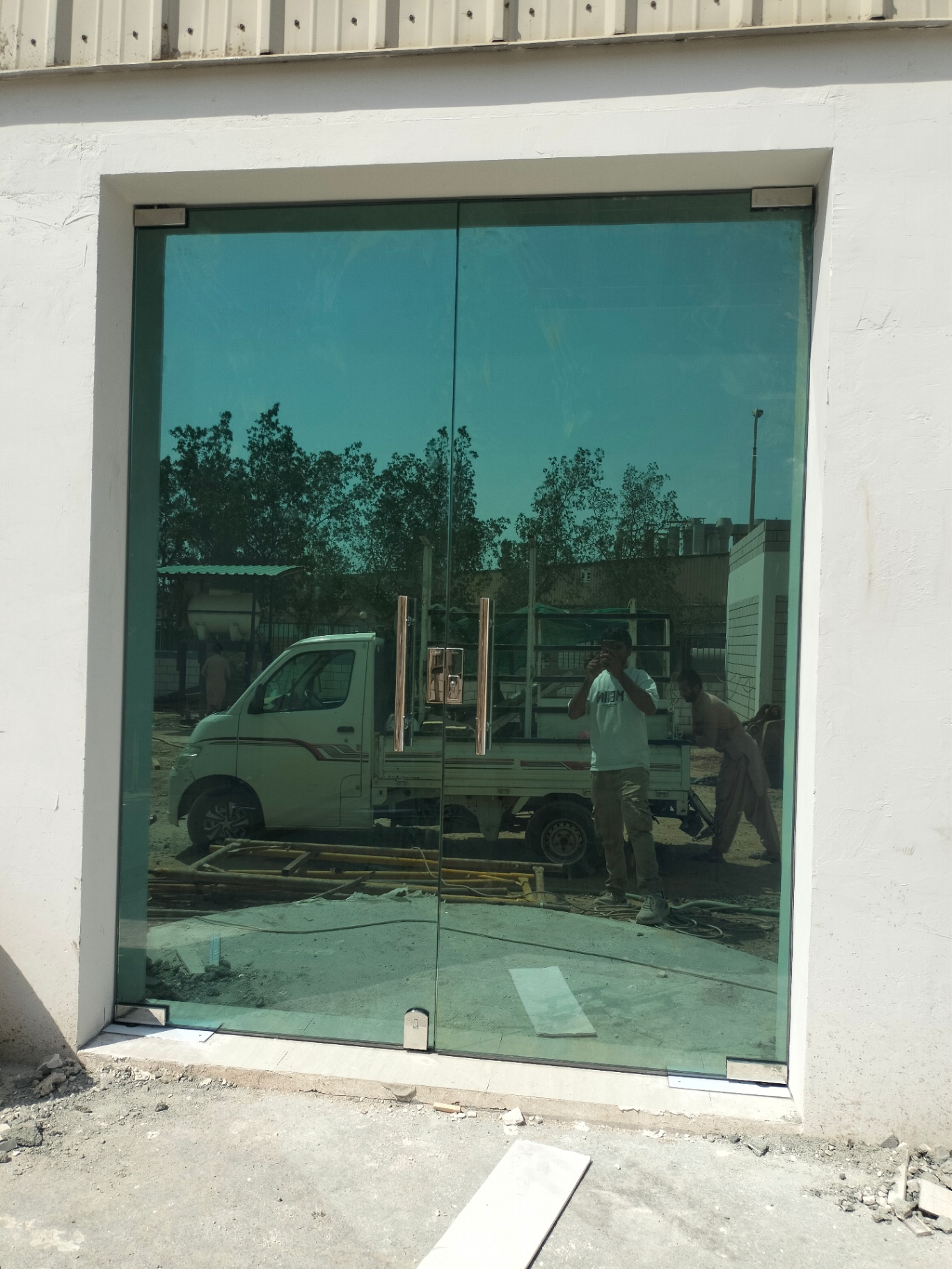 Tinted Green Glass Shopfront Doors