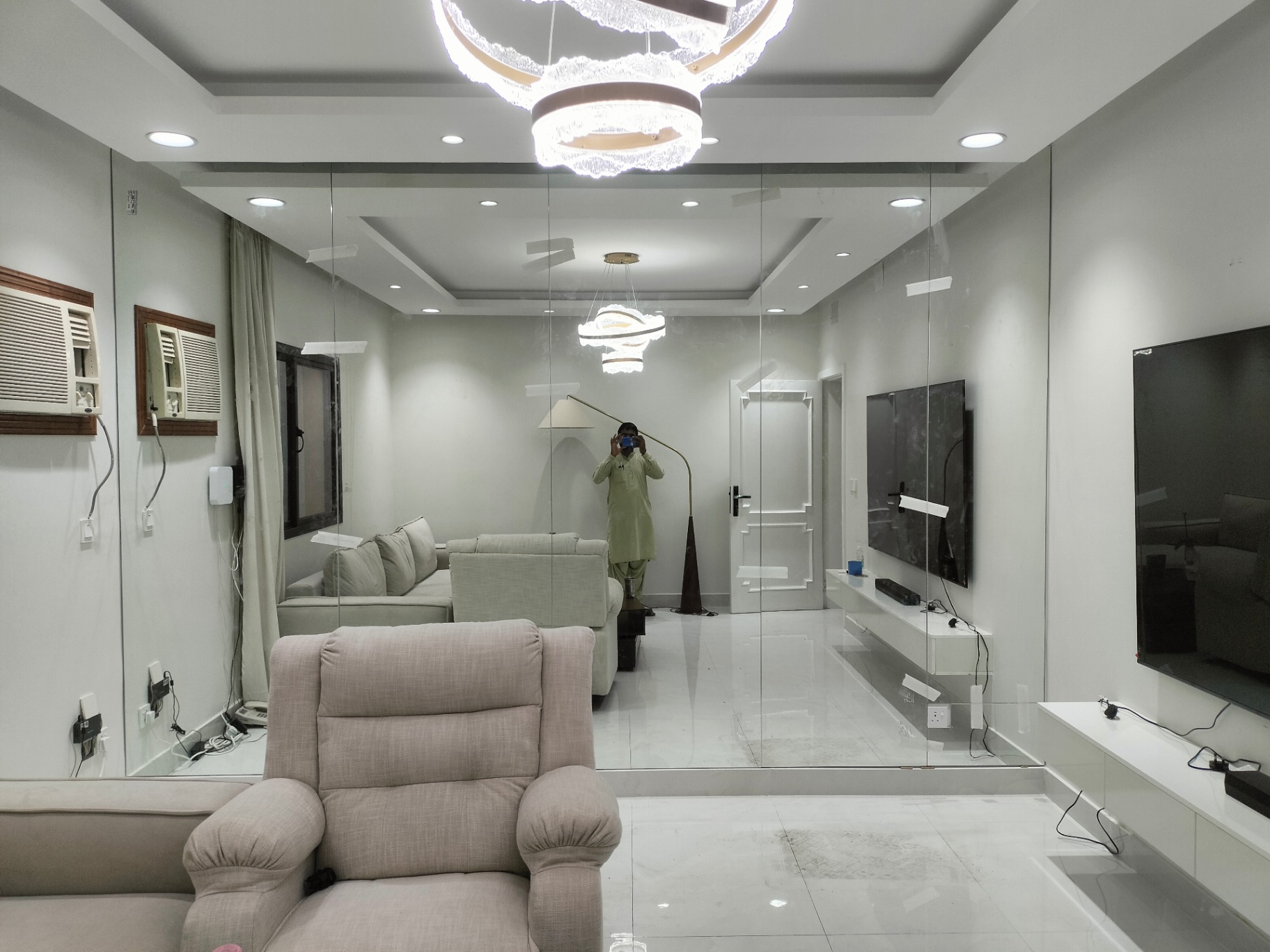Living room mirror feature wall
